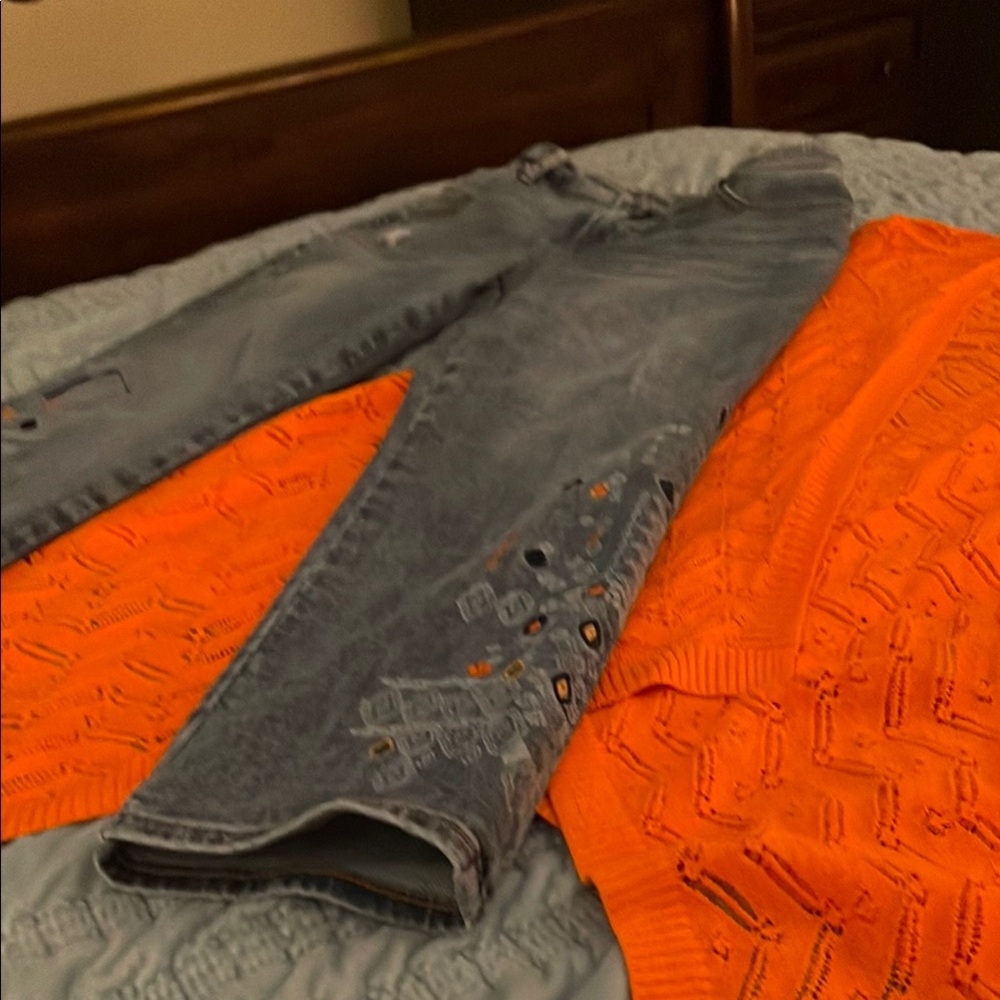 Stylish Blue Jeans and Orange Sweater